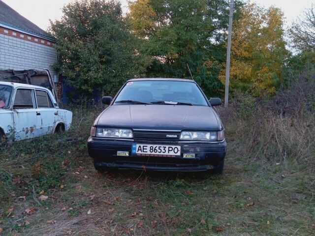 Серый Мазда 626, объемом двигателя 2 л и пробегом 300 тыс. км за 550 $, фото 1 на Automoto.ua