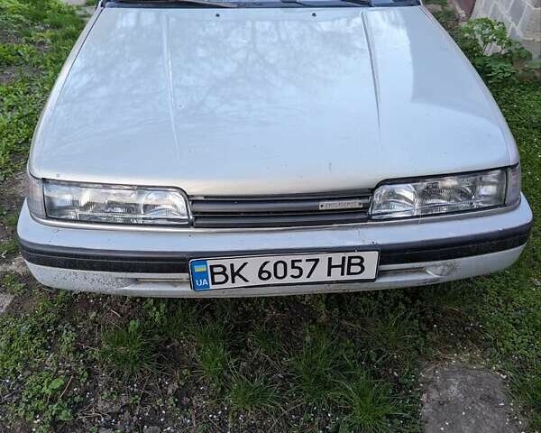 Серый Мазда 626, объемом двигателя 2 л и пробегом 190 тыс. км за 550 $, фото 1 на Automoto.ua