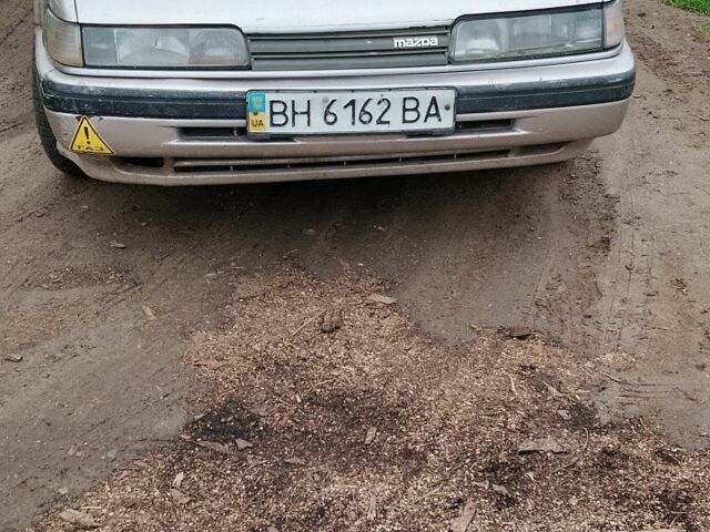 Серый Мазда 626, объемом двигателя 1.8 л и пробегом 328 тыс. км за 700 $, фото 1 на Automoto.ua
