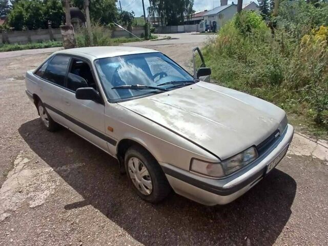 Серый Мазда 626, объемом двигателя 2 л и пробегом 400 тыс. км за 1800 $, фото 1 на Automoto.ua