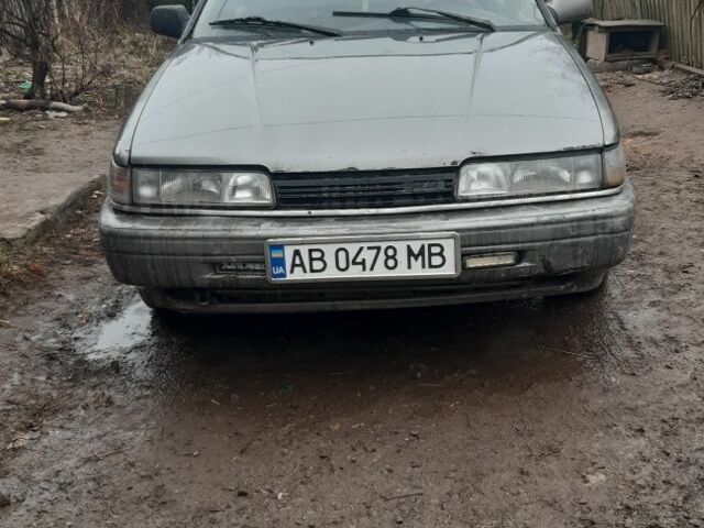 Серый Мазда 626, объемом двигателя 2 л и пробегом 200 тыс. км за 600 $, фото 1 на Automoto.ua