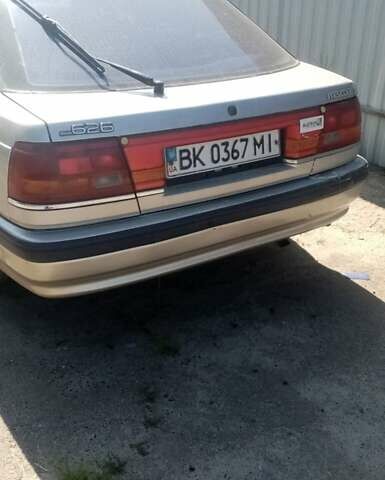 Сірий Мазда 626, об'ємом двигуна 2 л та пробігом 300 тис. км за 345 $, фото 1 на Automoto.ua