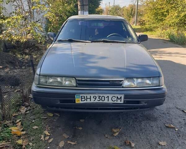 Мазда 626 1991 в Арцизе на Automoto.ua Серый Мазда 626, объемом двигателя 2 л и пробегом 350 тыс. км за 1400 $, фото 1 на Automoto.ua