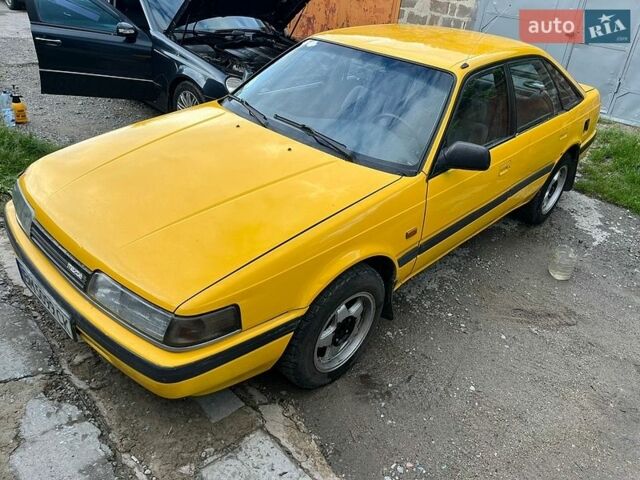 Серый Мазда 626, объемом двигателя 2 л и пробегом 325 тыс. км за 799 $, фото 1 на Automoto.ua