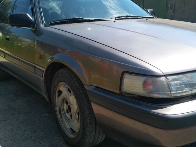 Сірий Мазда 626, об'ємом двигуна 2 л та пробігом 360 тис. км за 2300 $, фото 1 на Automoto.ua