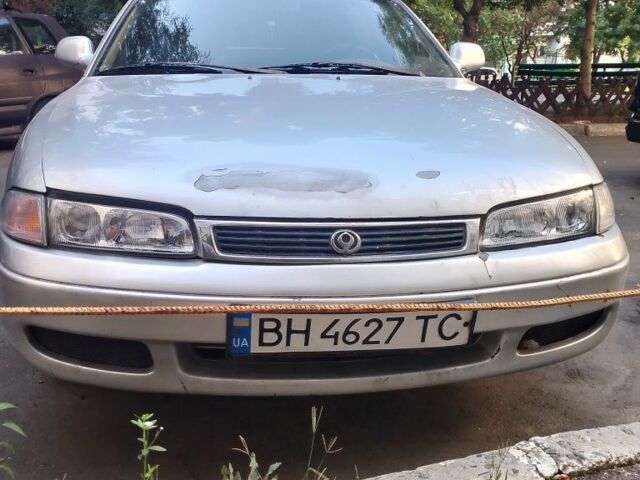 Серый Мазда 626, объемом двигателя 2.5 л и пробегом 300 тыс. км за 2000 $, фото 1 на Automoto.ua