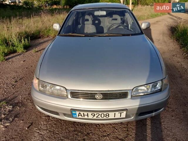 Серый Мазда 626, объемом двигателя 2 л и пробегом 490 тыс. км за 2200 $, фото 1 на Automoto.ua