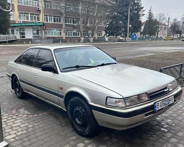 Сірий Мазда 626, об'ємом двигуна 2.18 л та пробігом 342 тис. км за 1800 $, фото 1 на Automoto.ua