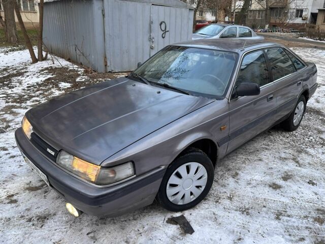 Серый Мазда 626, объемом двигателя 2 л и пробегом 200 тыс. км за 1150 $, фото 1 на Automoto.ua