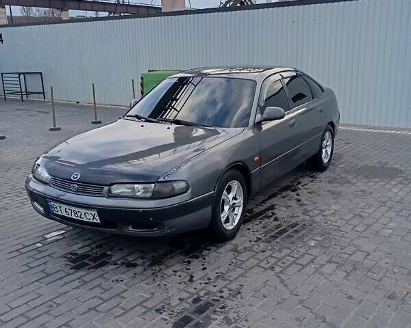 Серый Мазда 626, объемом двигателя 2 л и пробегом 250 тыс. км за 2200 $, фото 1 на Automoto.ua