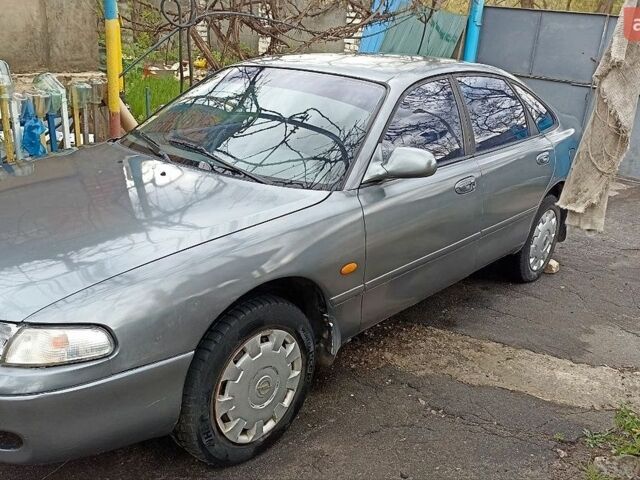 Серый Мазда 626, объемом двигателя 2 л и пробегом 350 тыс. км за 1500 $, фото 1 на Automoto.ua