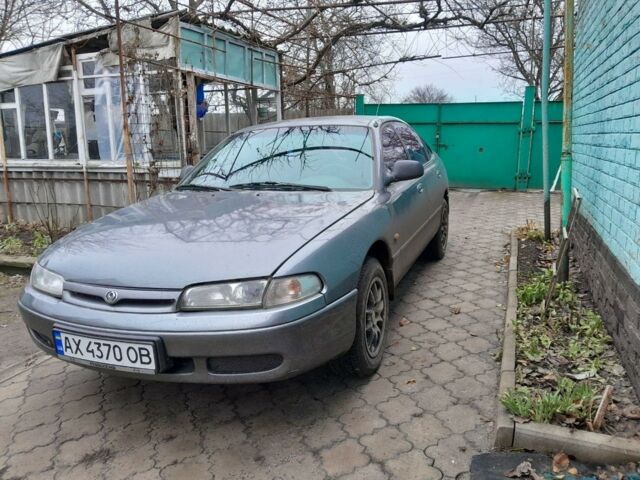 Серый Мазда 626, объемом двигателя 1.8 л и пробегом 450 тыс. км за 2400 $, фото 1 на Automoto.ua