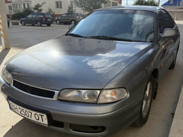 Сірий Мазда 626, об'ємом двигуна 2 л та пробігом 349 тис. км за 1900 $, фото 1 на Automoto.ua