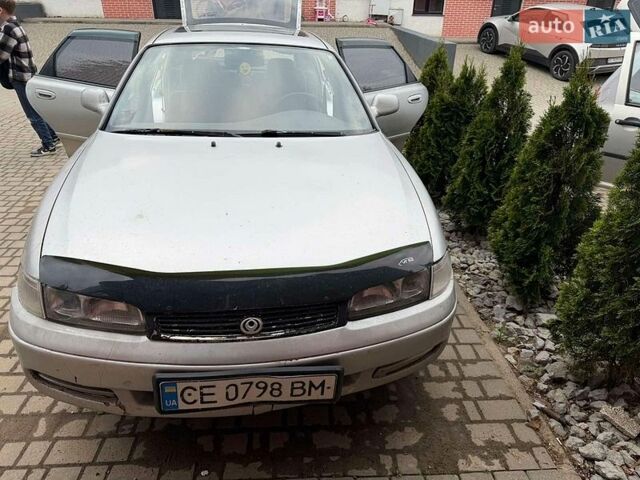 Серый Мазда 626, объемом двигателя 2.5 л и пробегом 438 тыс. км за 1000 $, фото 1 на Automoto.ua