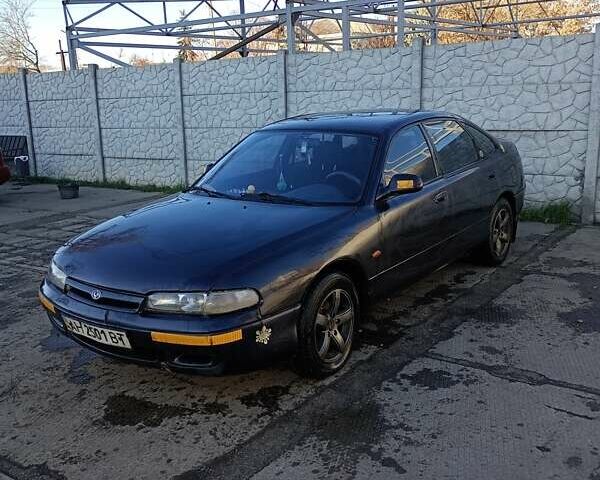 Серый Мазда 626, объемом двигателя 1.8 л и пробегом 444 тыс. км за 1100 $, фото 1 на Automoto.ua