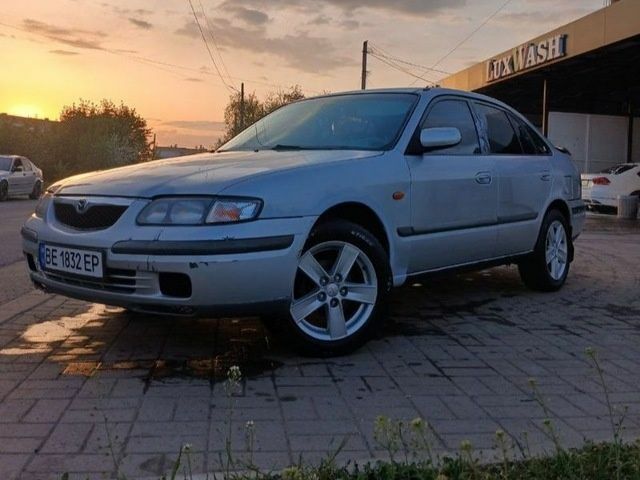 Серый Мазда 626, объемом двигателя 2 л и пробегом 1 тыс. км за 2700 $, фото 1 на Automoto.ua