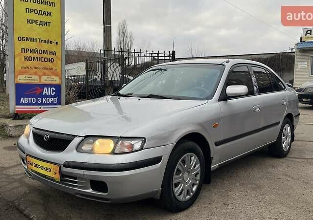 Сірий Мазда 626, об'ємом двигуна 2 л та пробігом 321 тис. км за 1900 $, фото 1 на Automoto.ua