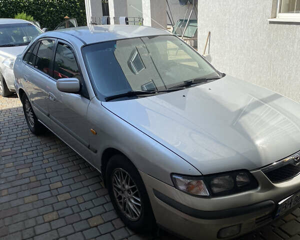 Серый Мазда 626, объемом двигателя 2 л и пробегом 540 тыс. км за 2800 $, фото 1 на Automoto.ua