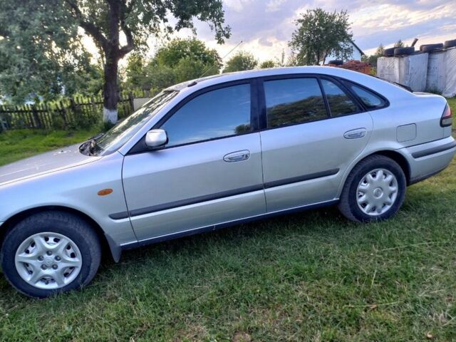 Серый Мазда 626, объемом двигателя 2 л и пробегом 380 тыс. км за 1900 $, фото 1 на Automoto.ua