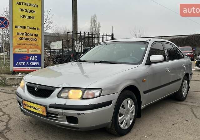 Сірий Мазда 626, об'ємом двигуна 2 л та пробігом 321 тис. км за 1990 $, фото 1 на Automoto.ua