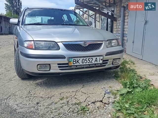 Серый Мазда 626, объемом двигателя 1.8 л и пробегом 286 тыс. км за 2199 $, фото 1 на Automoto.ua