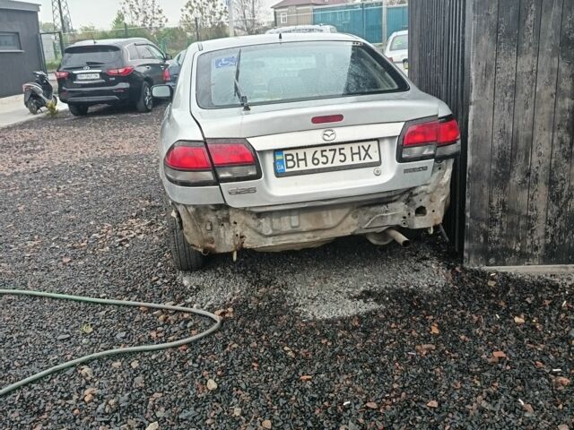 Серый Мазда 626, объемом двигателя 2 л и пробегом 234 тыс. км за 640 $, фото 1 на Automoto.ua