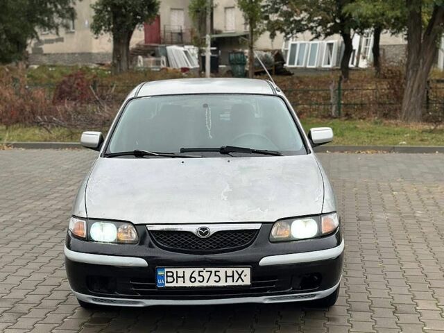 Серый Мазда 626, объемом двигателя 2 л и пробегом 390 тыс. км за 1600 $, фото 1 на Automoto.ua