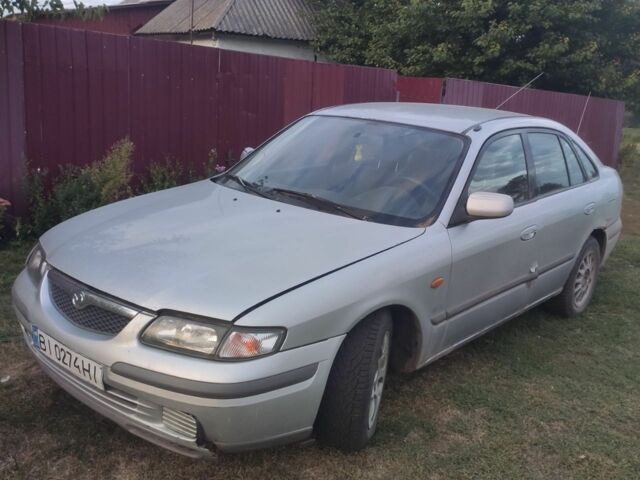 Серый Мазда 626, объемом двигателя 2 л и пробегом 250 тыс. км за 800 $, фото 1 на Automoto.ua