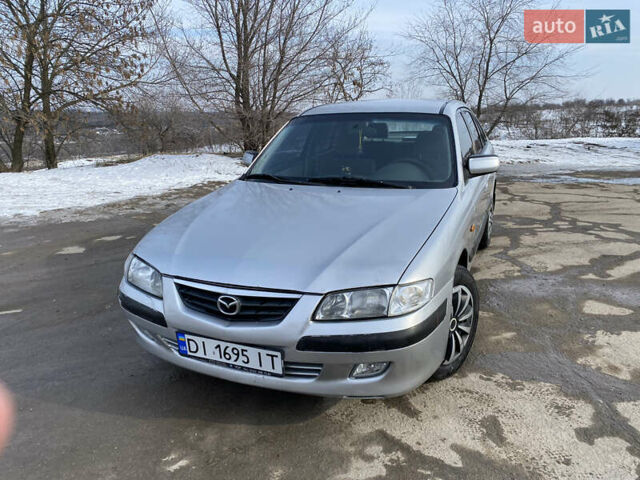 Серый Мазда 626, объемом двигателя 2 л и пробегом 274 тыс. км за 2600 $, фото 1 на Automoto.ua