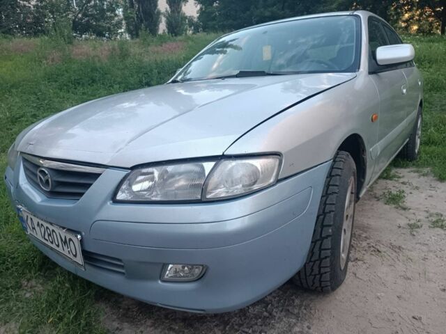 Серый Мазда 626, объемом двигателя 2 л и пробегом 344 тыс. км за 1700 $, фото 1 на Automoto.ua