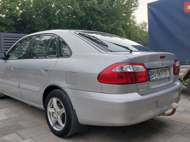 Серый Мазда 626, объемом двигателя 2 л и пробегом 224 тыс. км за 3300 $, фото 1 на Automoto.ua