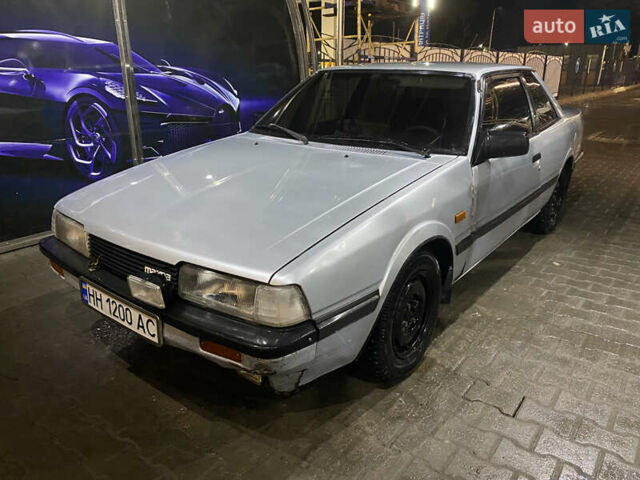 Серый Мазда 626, объемом двигателя 1.6 л и пробегом 312 тыс. км за 1200 $, фото 1 на Automoto.ua