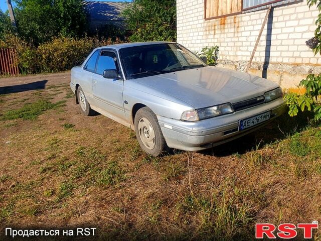 Серый Мазда 626, объемом двигателя 2 л и пробегом 380 тыс. км за 949 $, фото 1 на Automoto.ua