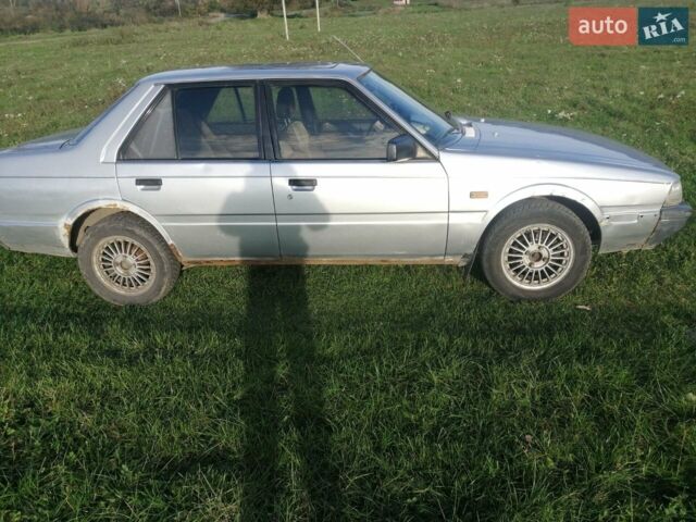 Серый Мазда 626, объемом двигателя 2 л и пробегом 410 тыс. км за 700 $, фото 1 на Automoto.ua