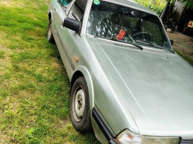 Серый Мазда 626, объемом двигателя 2 л и пробегом 477 тыс. км за 600 $, фото 1 на Automoto.ua