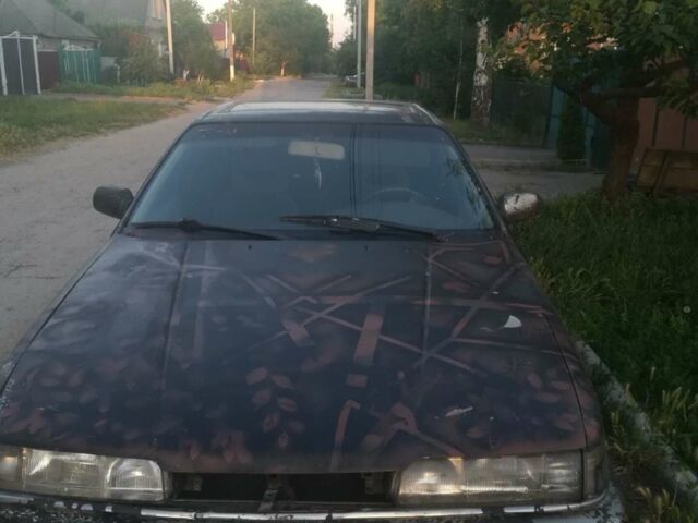 Серый Мазда 626, объемом двигателя 0 л и пробегом 100 тыс. км за 600 $, фото 1 на Automoto.ua