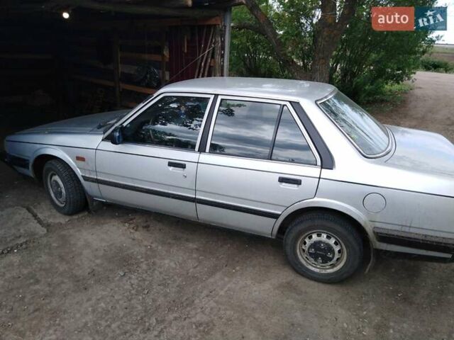 Серый Мазда 626, объемом двигателя 1.6 л и пробегом 282 тыс. км за 1500 $, фото 1 на Automoto.ua