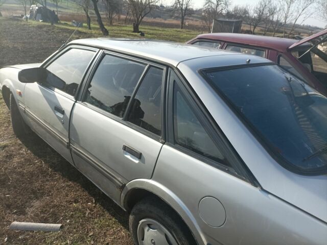 Серый Мазда 626, объемом двигателя 0 л и пробегом 900 тыс. км за 709 $, фото 1 на Automoto.ua