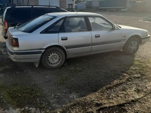 Серый Мазда 626, объемом двигателя 2 л и пробегом 300 тыс. км за 1000 $, фото 1 на Automoto.ua