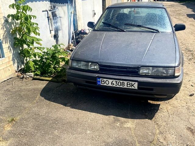 Серый Мазда 626, объемом двигателя 2 л и пробегом 0 тыс. км за 850 $, фото 1 на Automoto.ua
