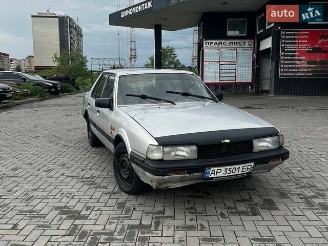Серый Мазда 626, объемом двигателя 1.6 л и пробегом 123 тыс. км за 500 $, фото 1 на Automoto.ua