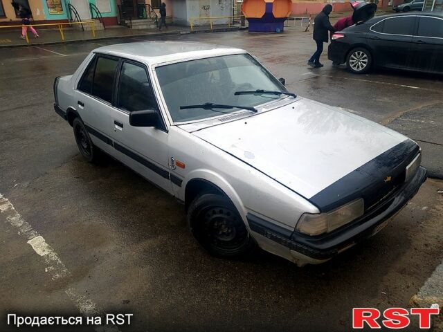 Серый Мазда 626, объемом двигателя 1.6 л и пробегом 258 тыс. км за 500 $, фото 1 на Automoto.ua