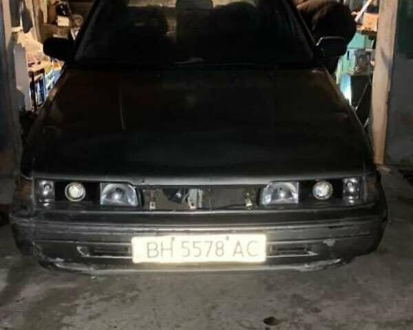 Серый Мазда 626, объемом двигателя 2 л и пробегом 123 тыс. км за 550 $, фото 1 на Automoto.ua