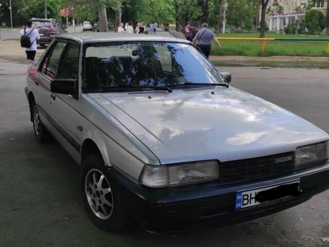 Серый Мазда 626, объемом двигателя 2 л и пробегом 412 тыс. км за 1500 $, фото 1 на Automoto.ua