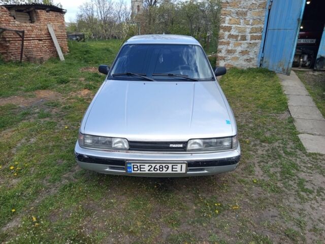 Серый Мазда 626, объемом двигателя 2 л и пробегом 300 тыс. км за 700 $, фото 1 на Automoto.ua