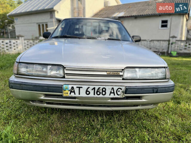 Серый Мазда 626, объемом двигателя 2 л и пробегом 200 тыс. км за 900 $, фото 1 на Automoto.ua