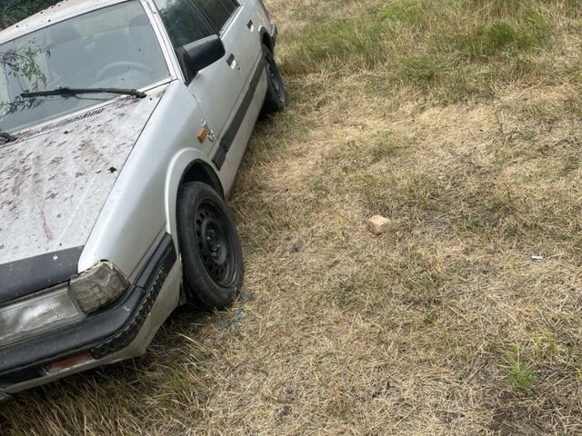 Сірий Мазда 626, об'ємом двигуна 1.6 л та пробігом 300 тис. км за 247 $, фото 1 на Automoto.ua