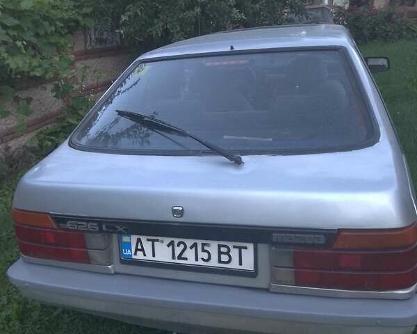 Серый Мазда 626, объемом двигателя 1.6 л и пробегом 248 тыс. км за 700 $, фото 1 на Automoto.ua