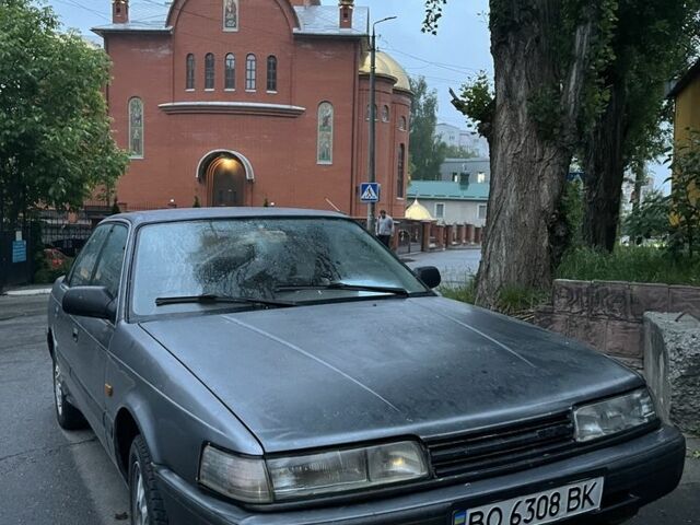 Серый Мазда 626, объемом двигателя 2 л и пробегом 50 тыс. км за 500 $, фото 1 на Automoto.ua