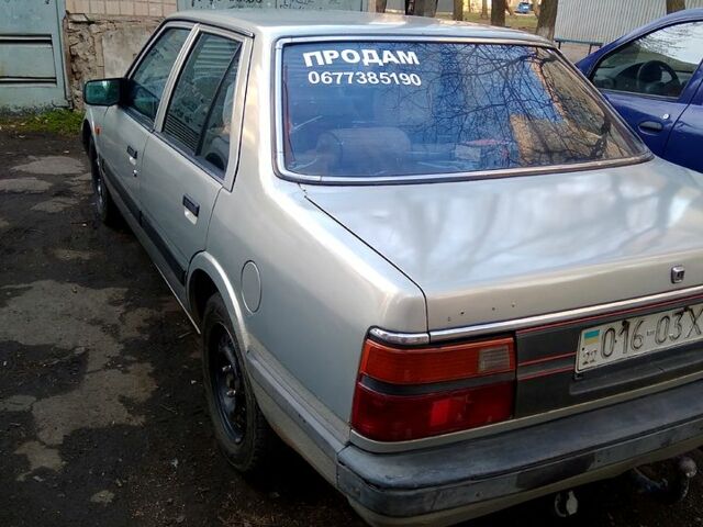 Сірий Мазда 626, об'ємом двигуна 20 л та пробігом 0 тис. км за 1170 $, фото 1 на Automoto.ua